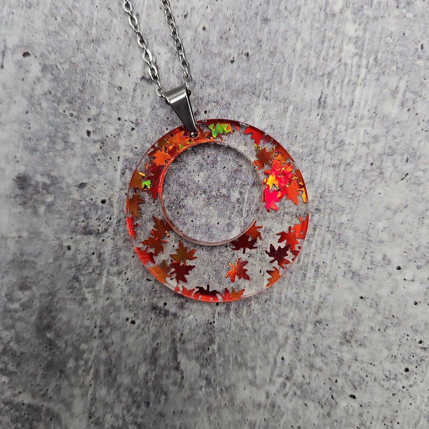 Large Offset Circle Orange Falling Leaves Necklace