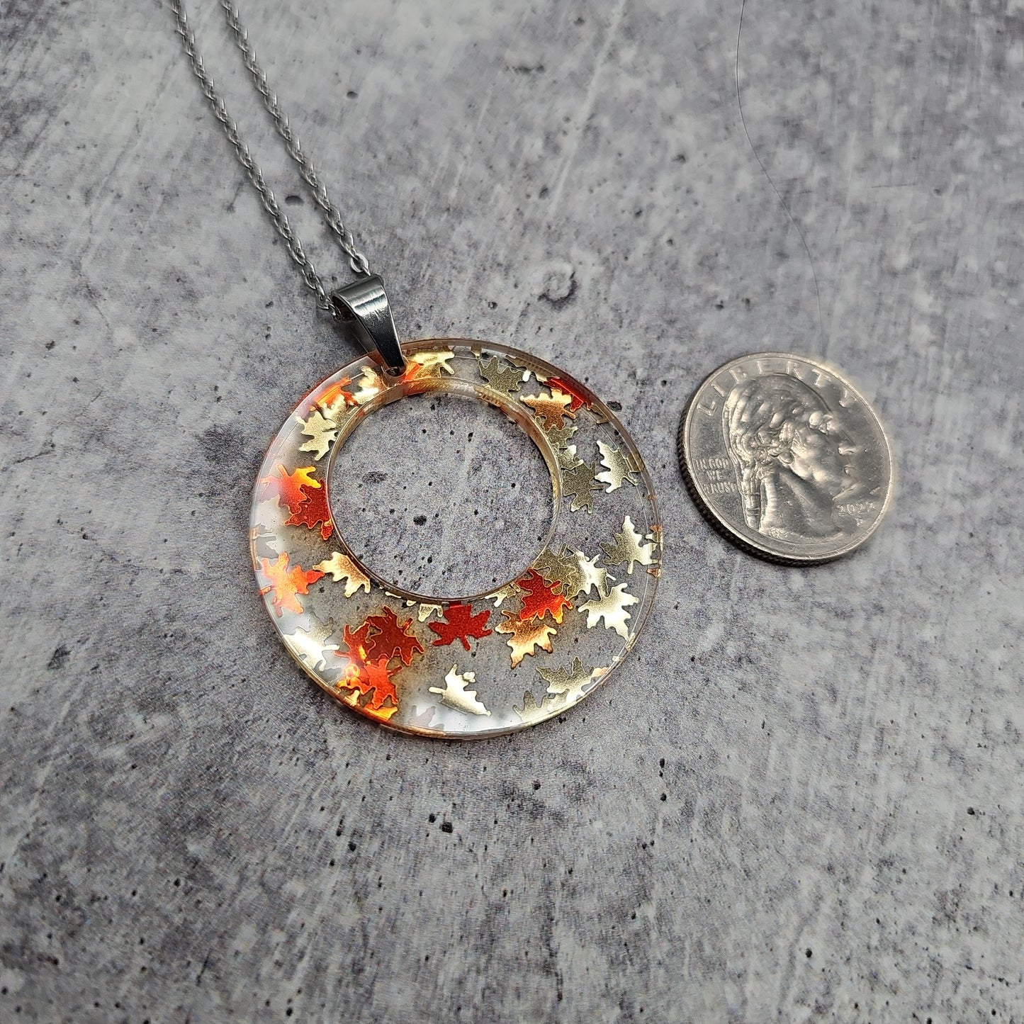 Large Offset Circle Golden Falling Leaves Necklace