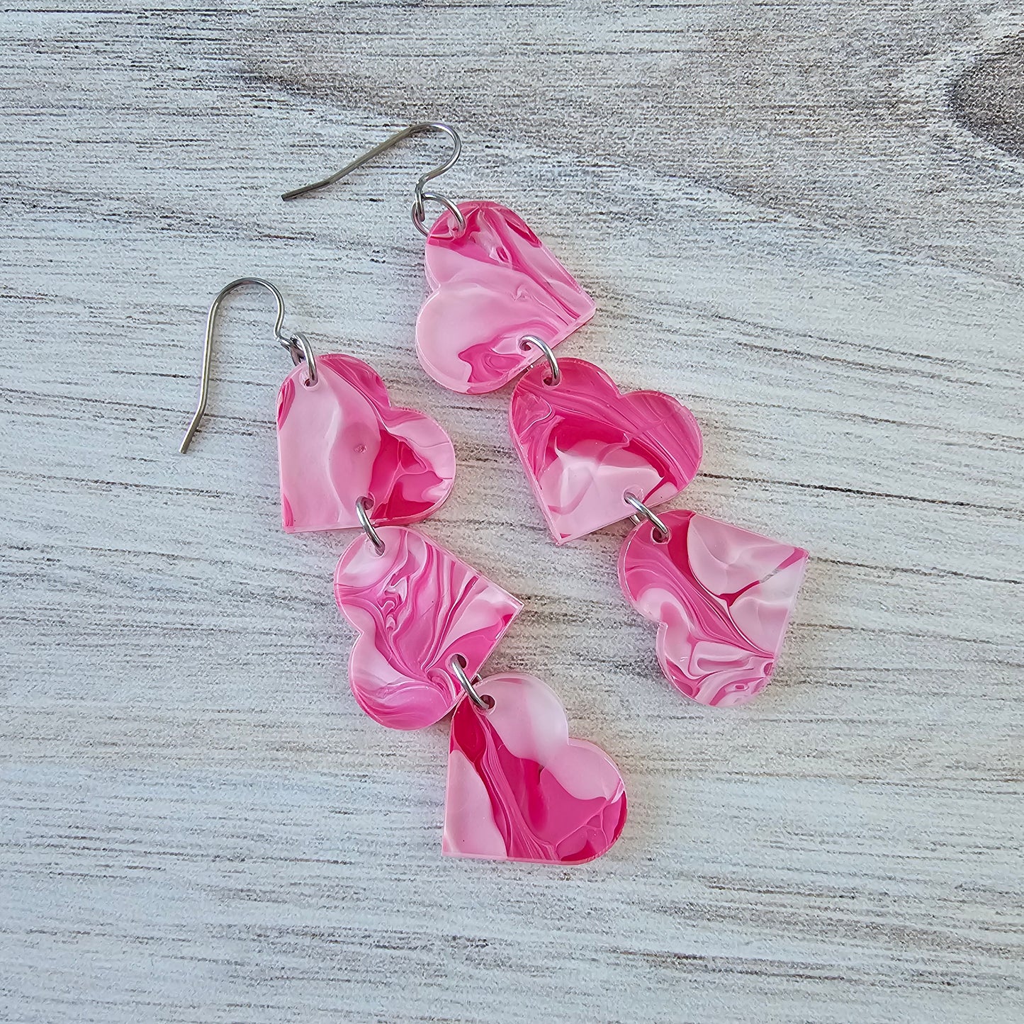 Hot Pink Swirl Tumbling Heart Earrings