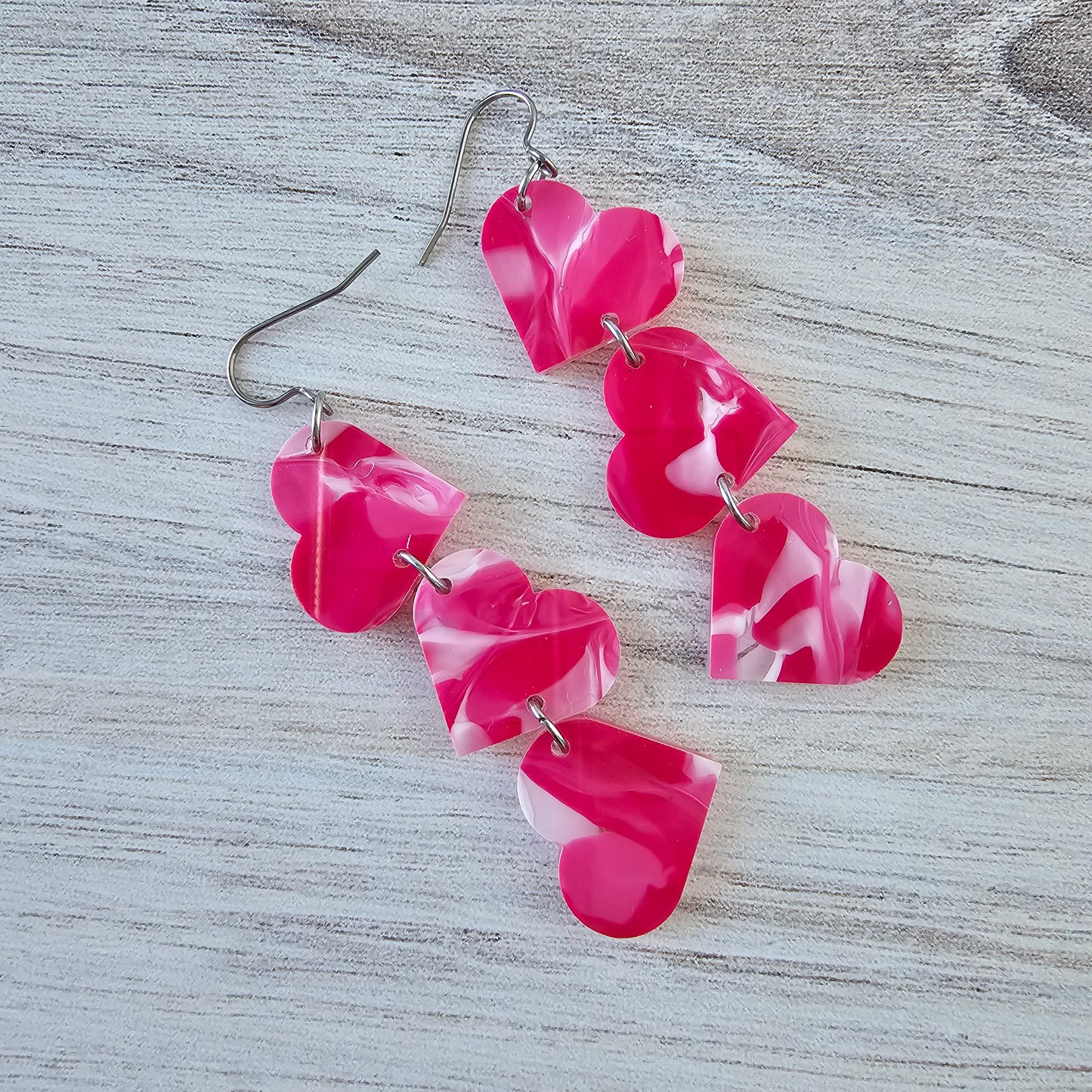 Hot Pink Swirl Tumbling Heart Earrings