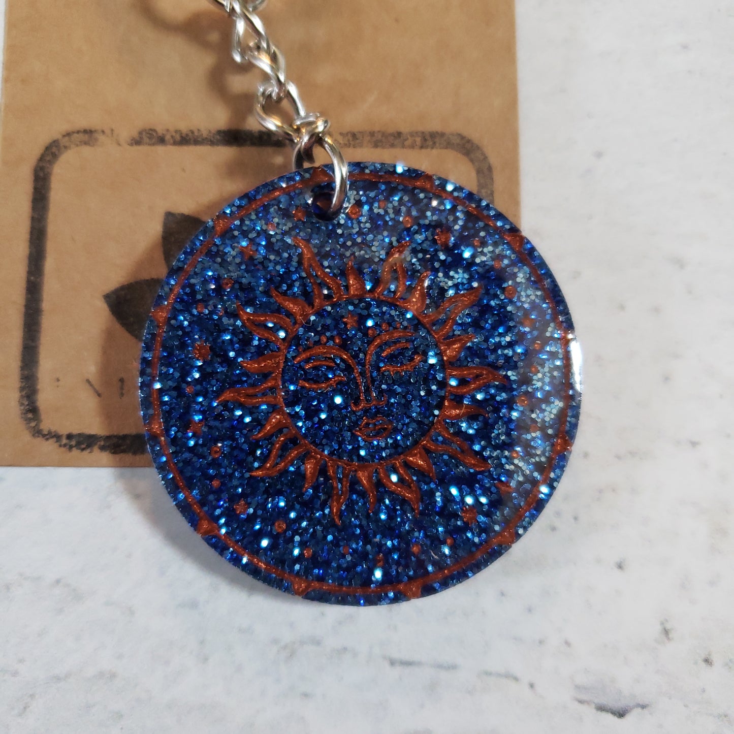 Blue Glitter Bronze Fill Engraved Sun Keychain