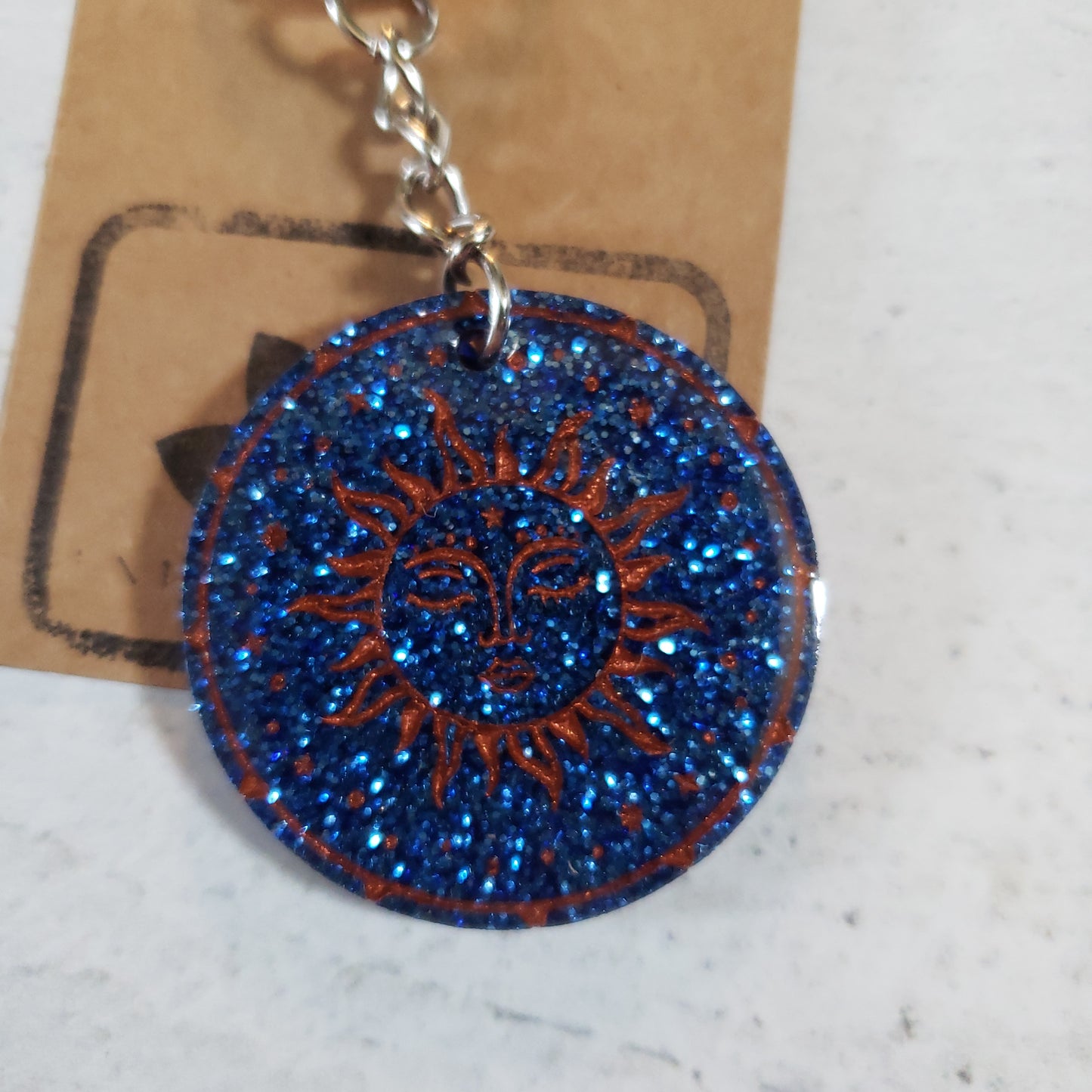 Blue Glitter Bronze Fill Engraved Sun Keychain