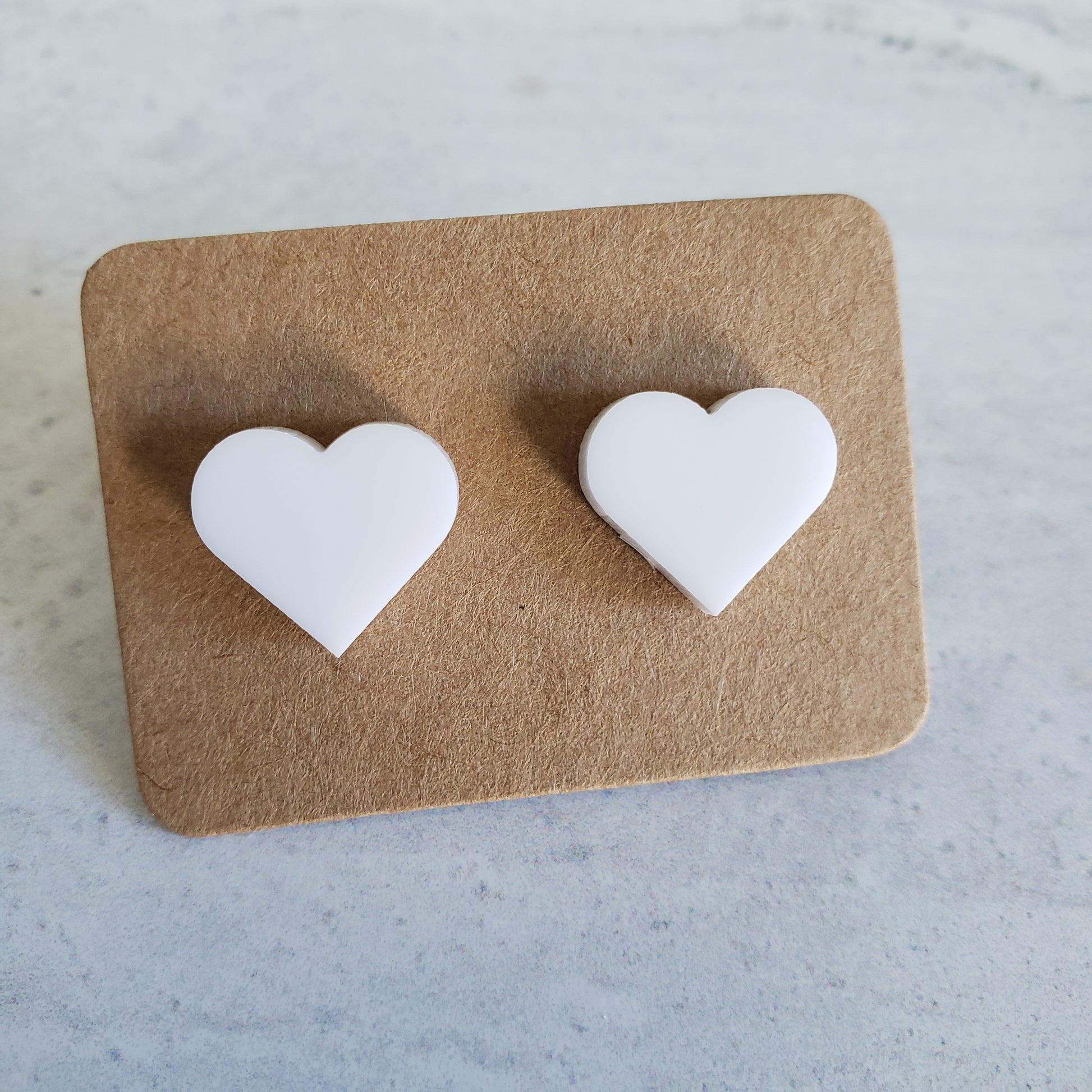 gloss white heart shaped stud earrings