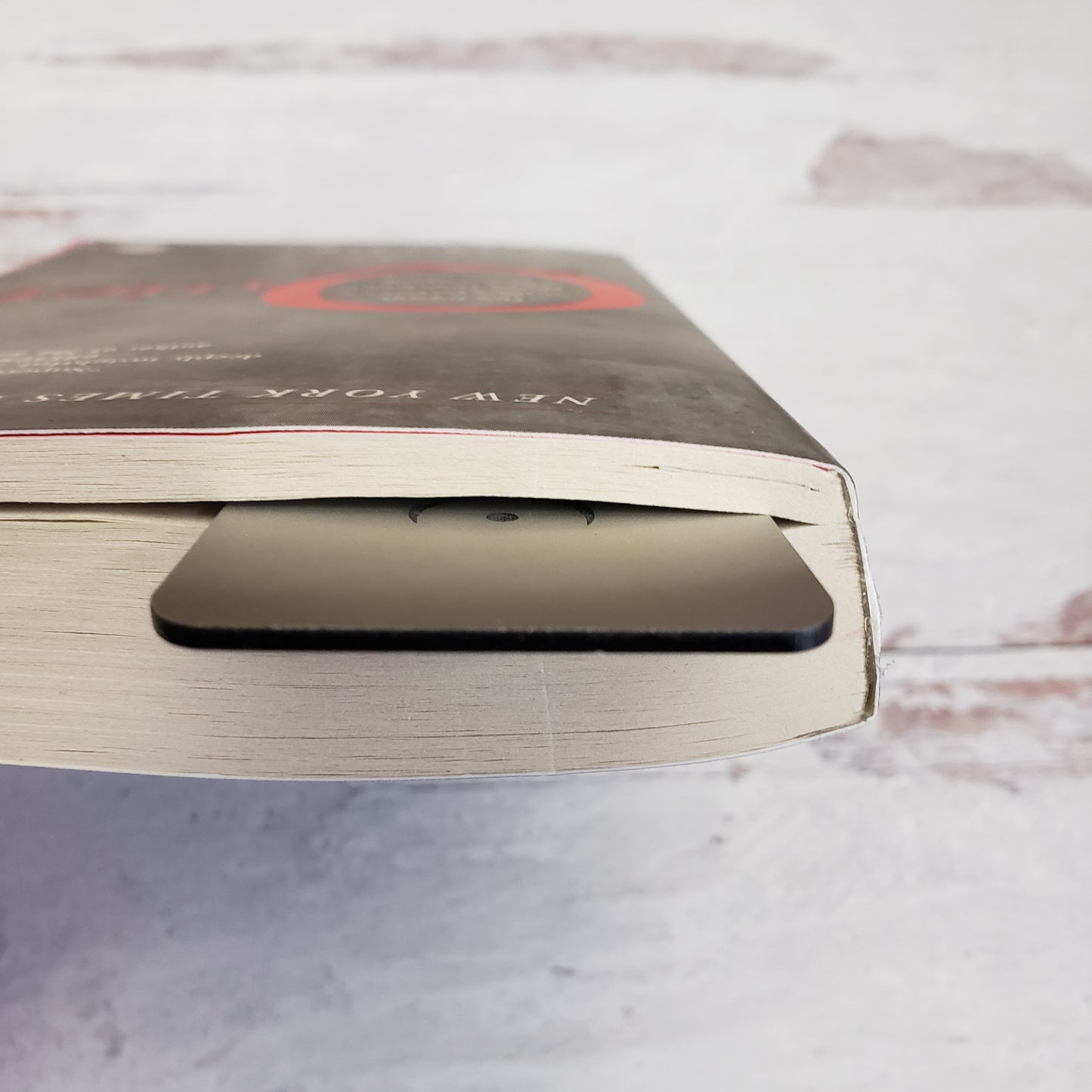 book with bookmark in it to show thickness