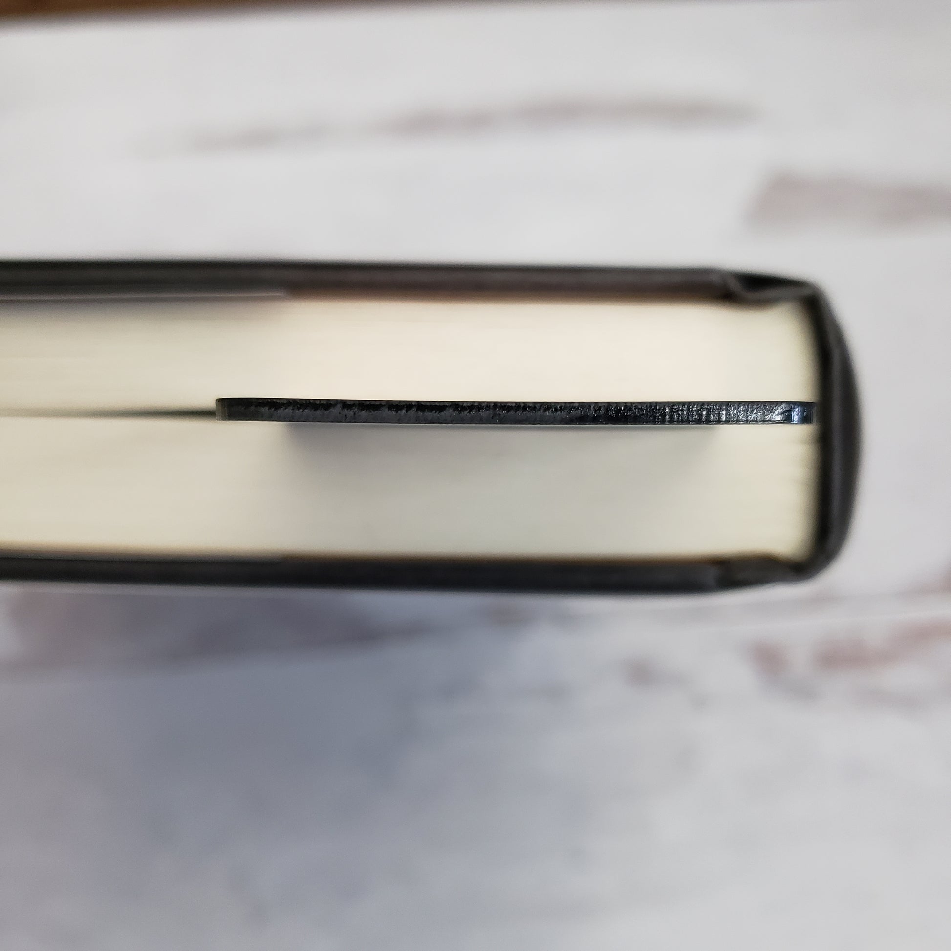 book with bookmark to show thickness