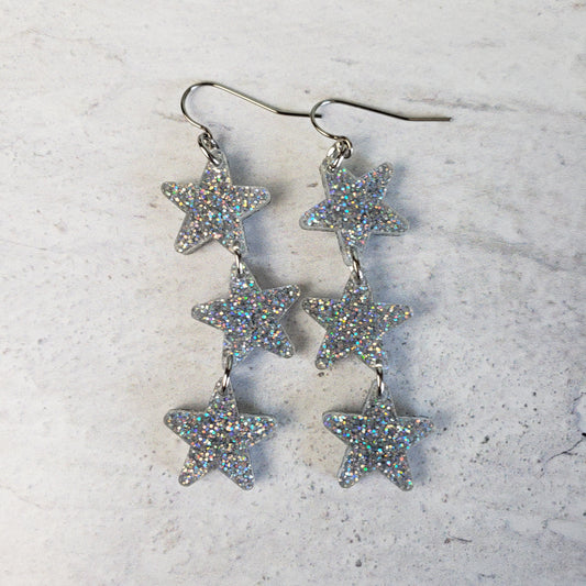 Silver holographic star dangle earrings