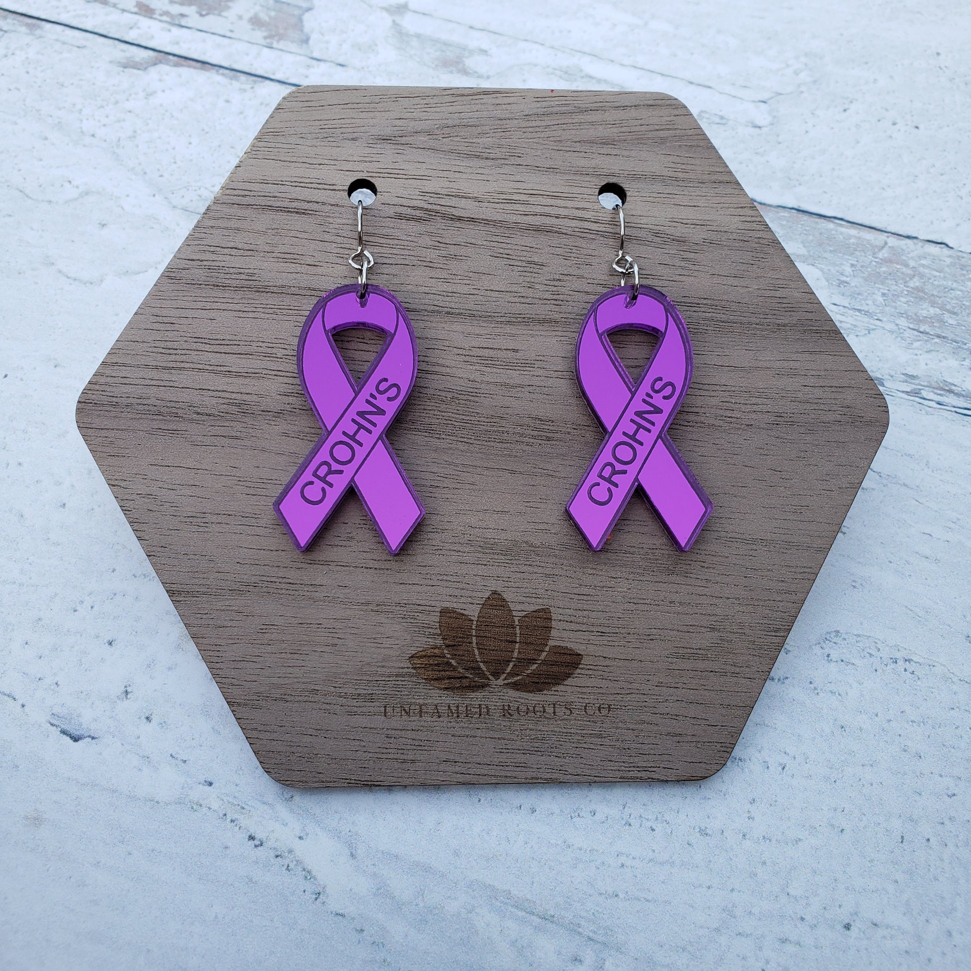 Crohn's Engraved purple mirror acrylic awareness ribbons on stainless steel earring wires.