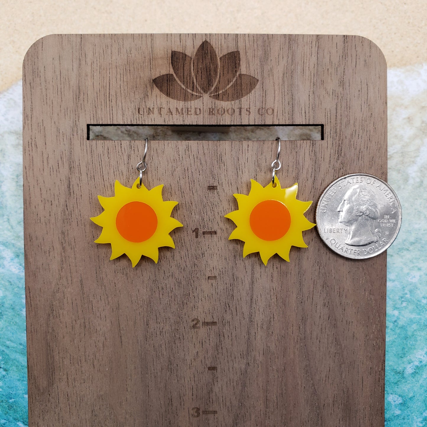 2 tone sun dangle earrings