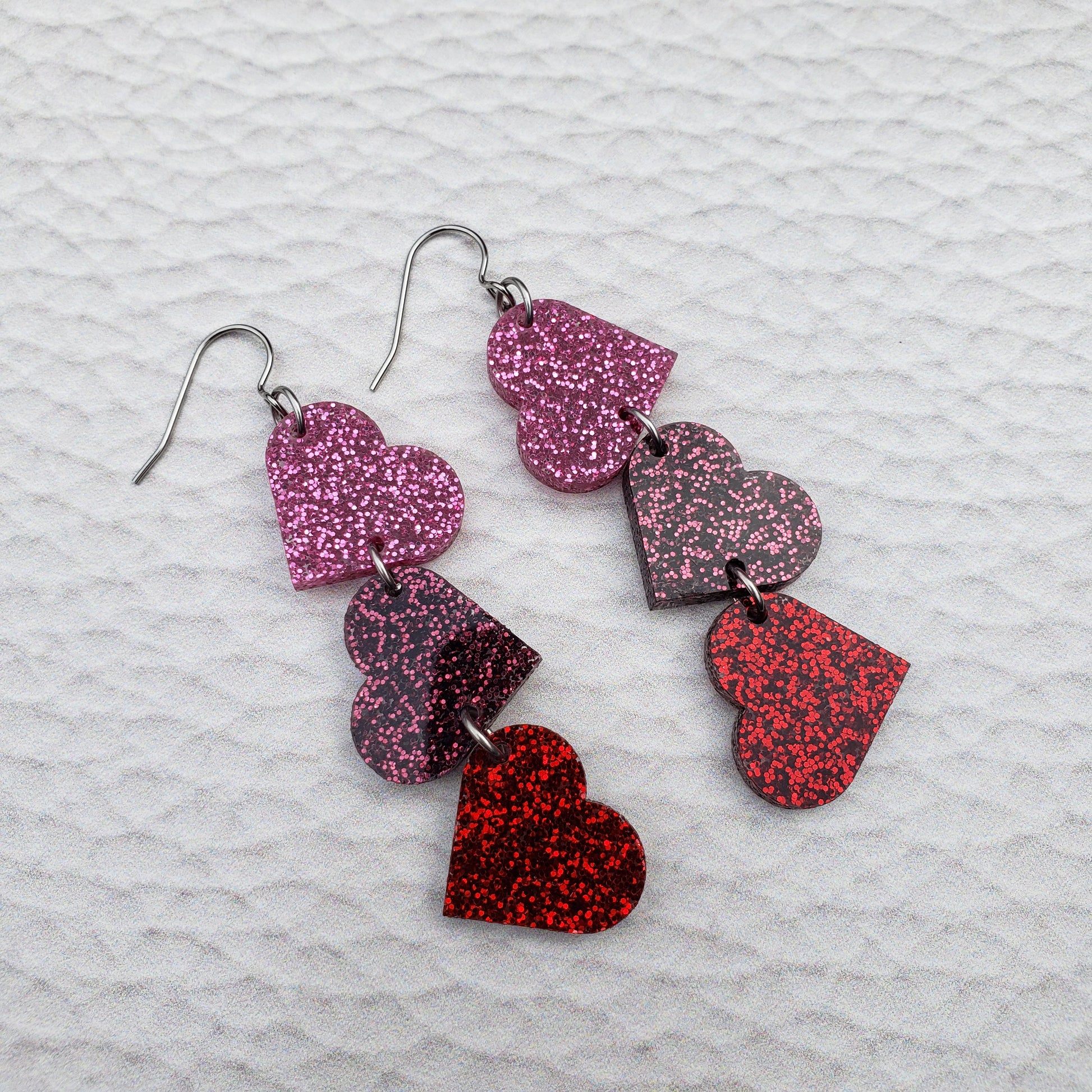 Pink and Red Glitter Tumbling Heart Earrings on Stainless Steel