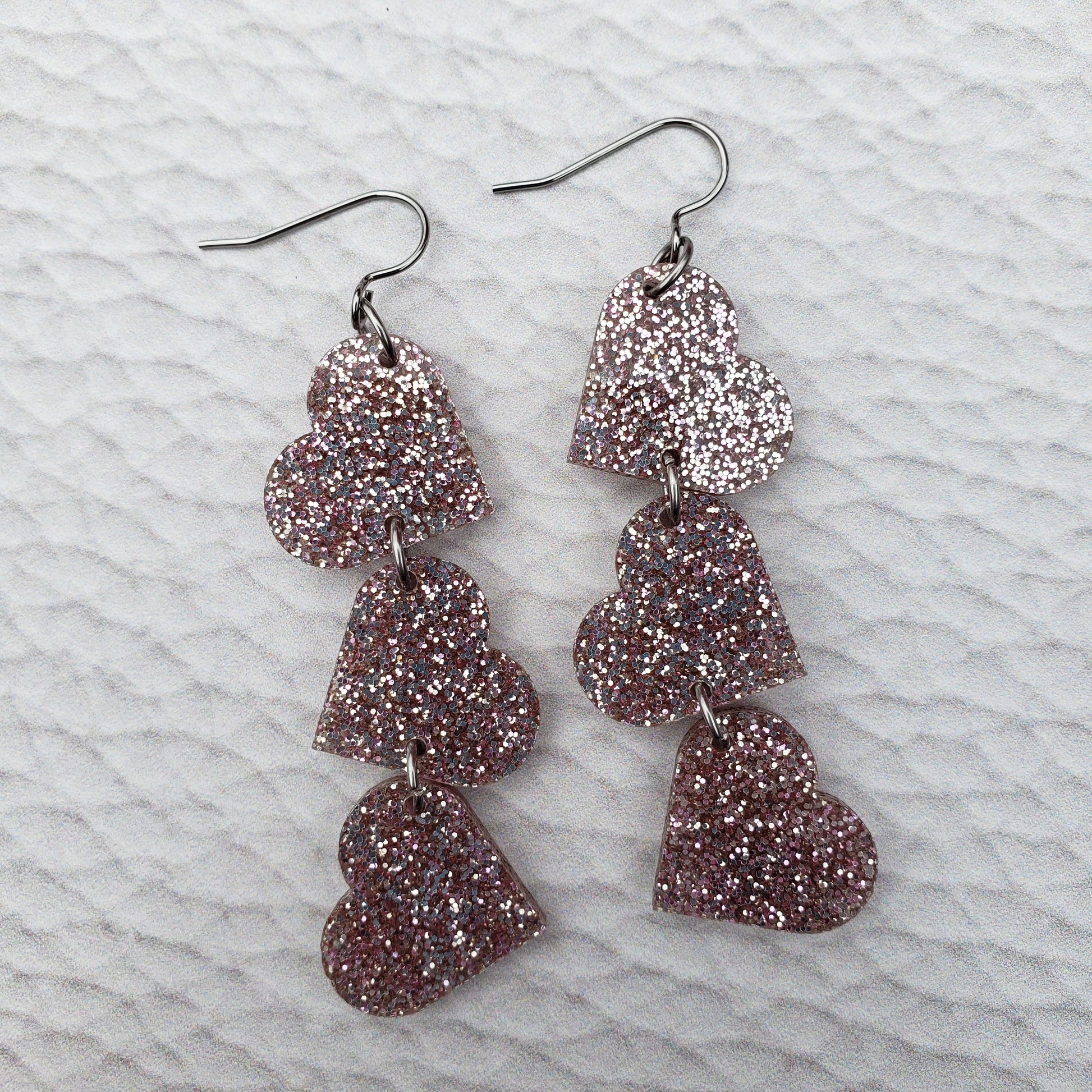 Rose Gold Glitter Tumbling Heart Earrings on Stainless Steel