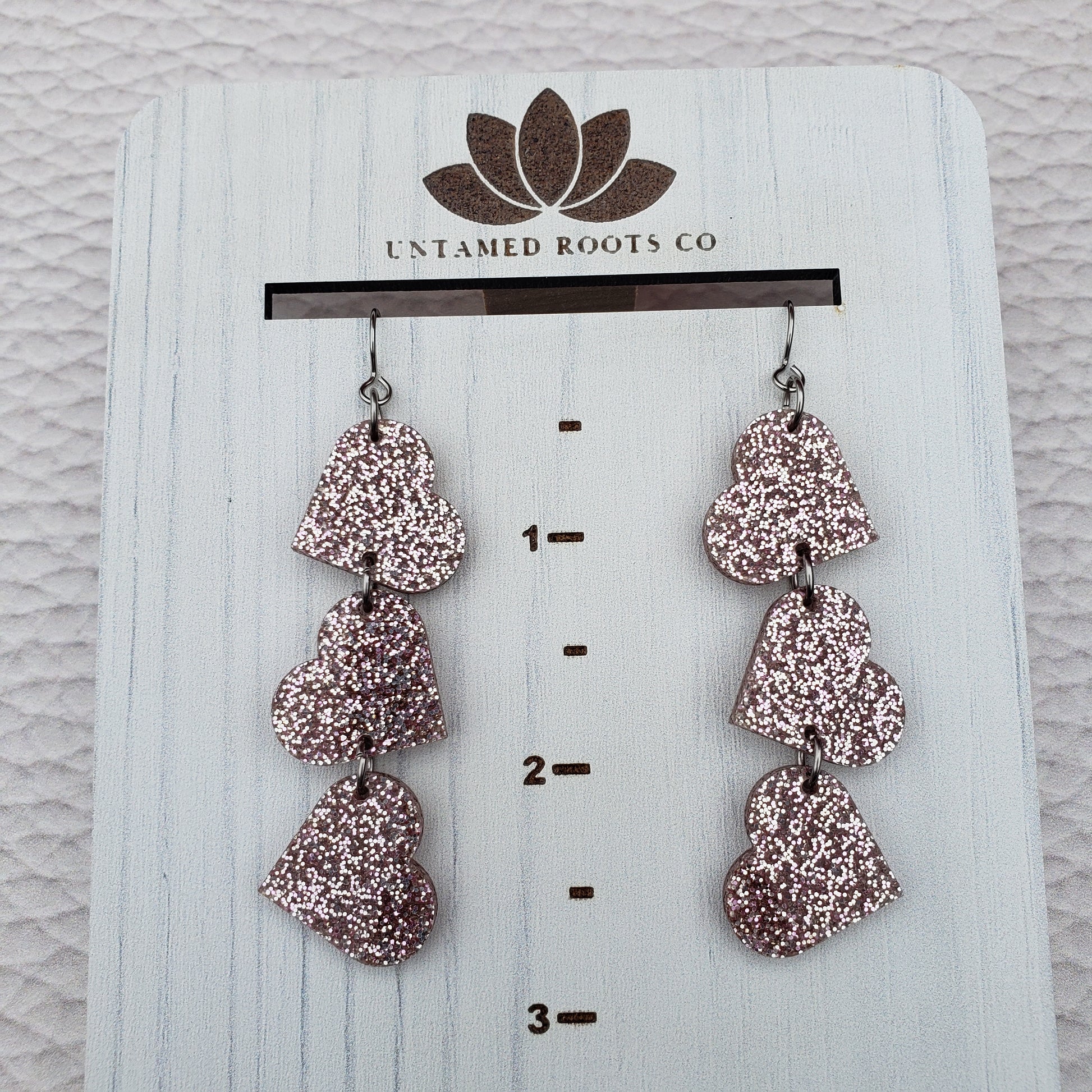 Rose Gold Glitter Tumbling Heart Earrings on Stainless Steel