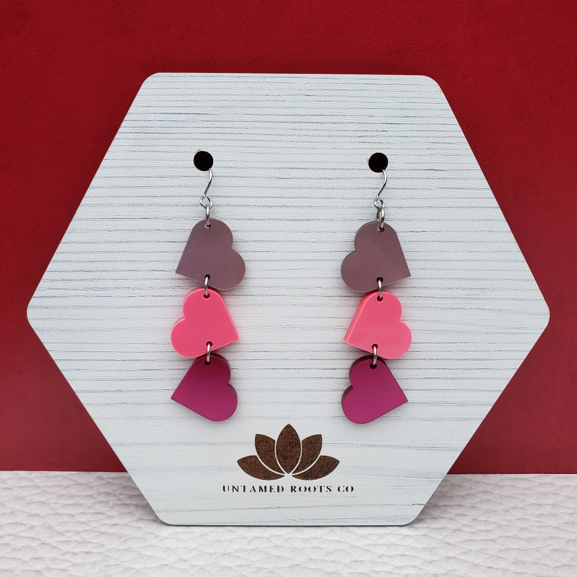 Pink Metallic Tumbling Heart Earrings on Stainless Steel