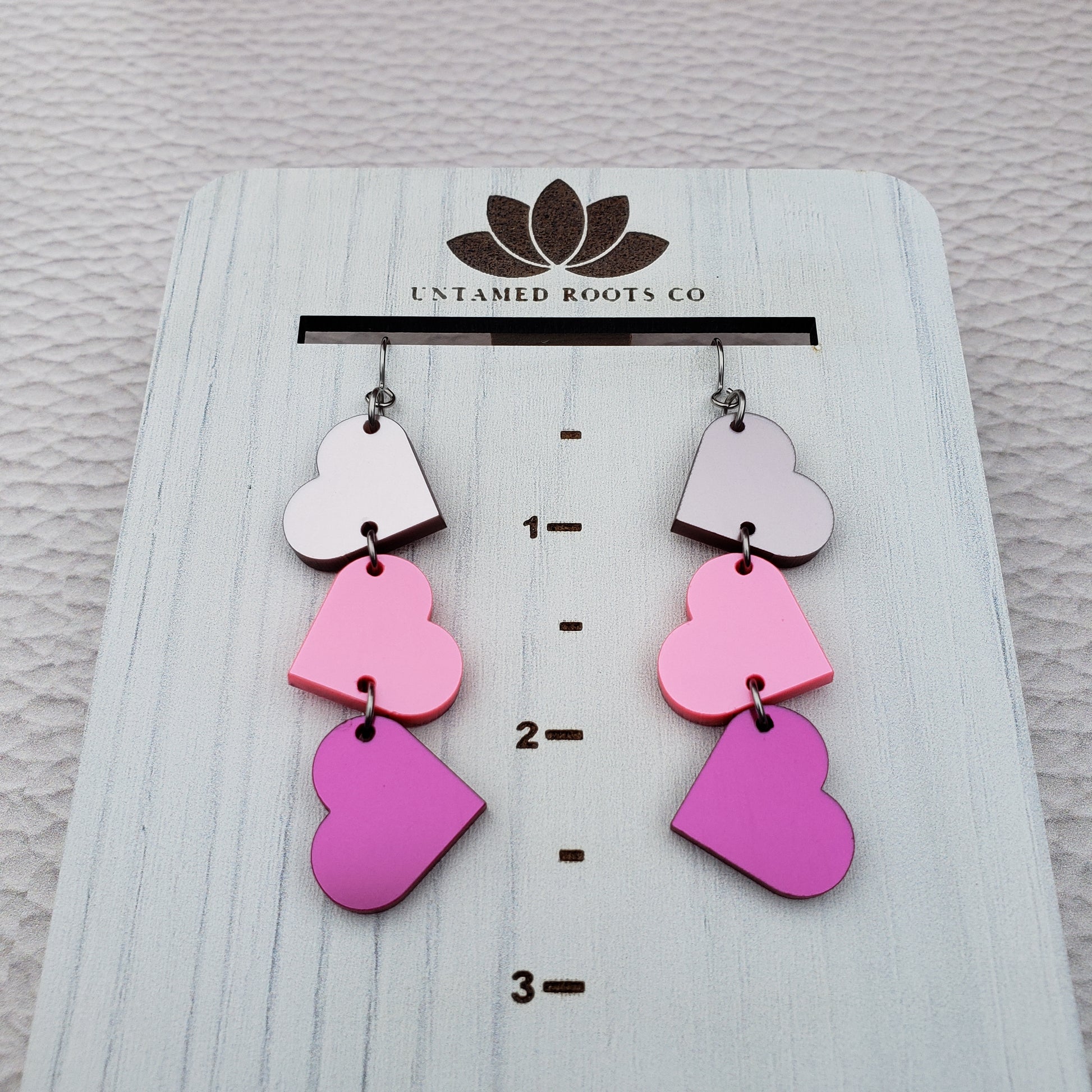 Pink Metallic Tumbling Heart Earrings on Stainless Steel