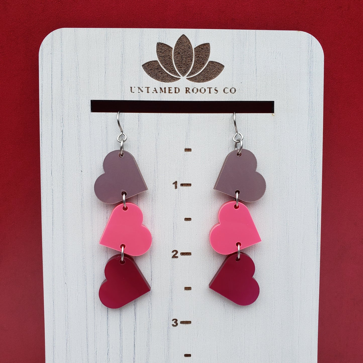 Pink Metallic Tumbling Heart Earrings on Stainless Steel