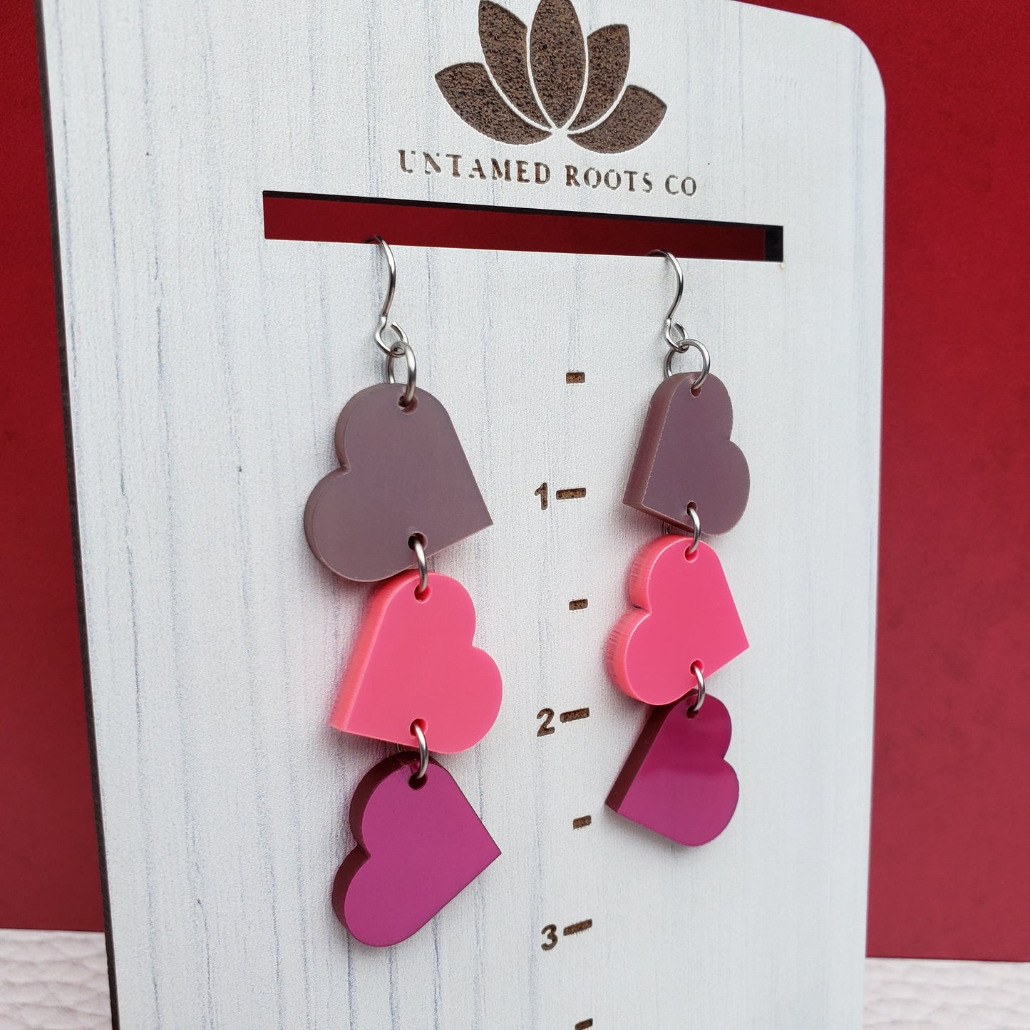 Pink Metallic Tumbling Heart Earrings on Stainless Steel