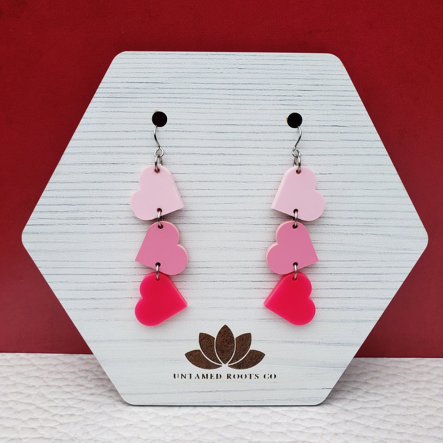 Matte Pink Tumbling Heart Earrings on Stainless Steel