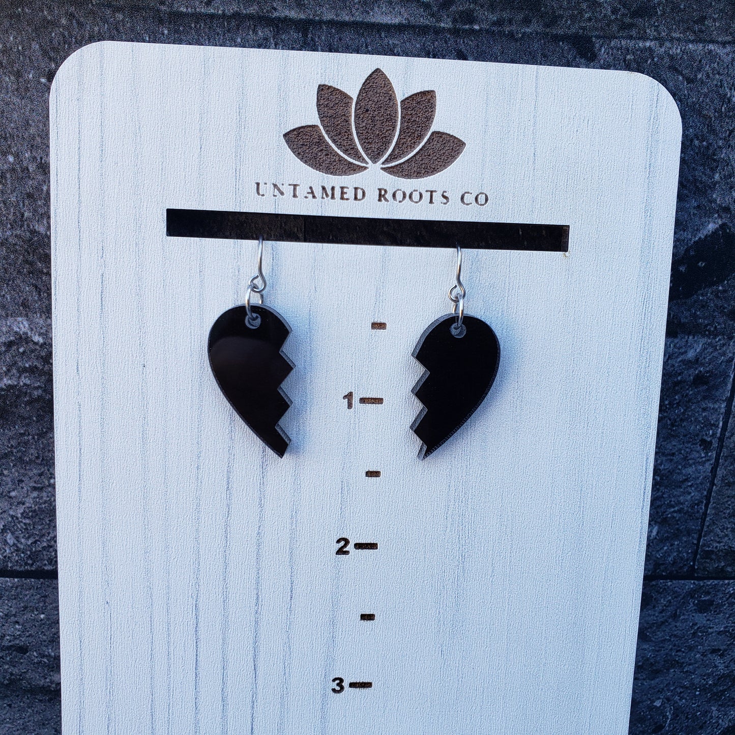 Black broken heart dangle earrings