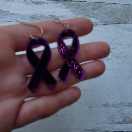 Video of Classic purple mirror acrylic awareness ribbons on stainless steel earring wires.