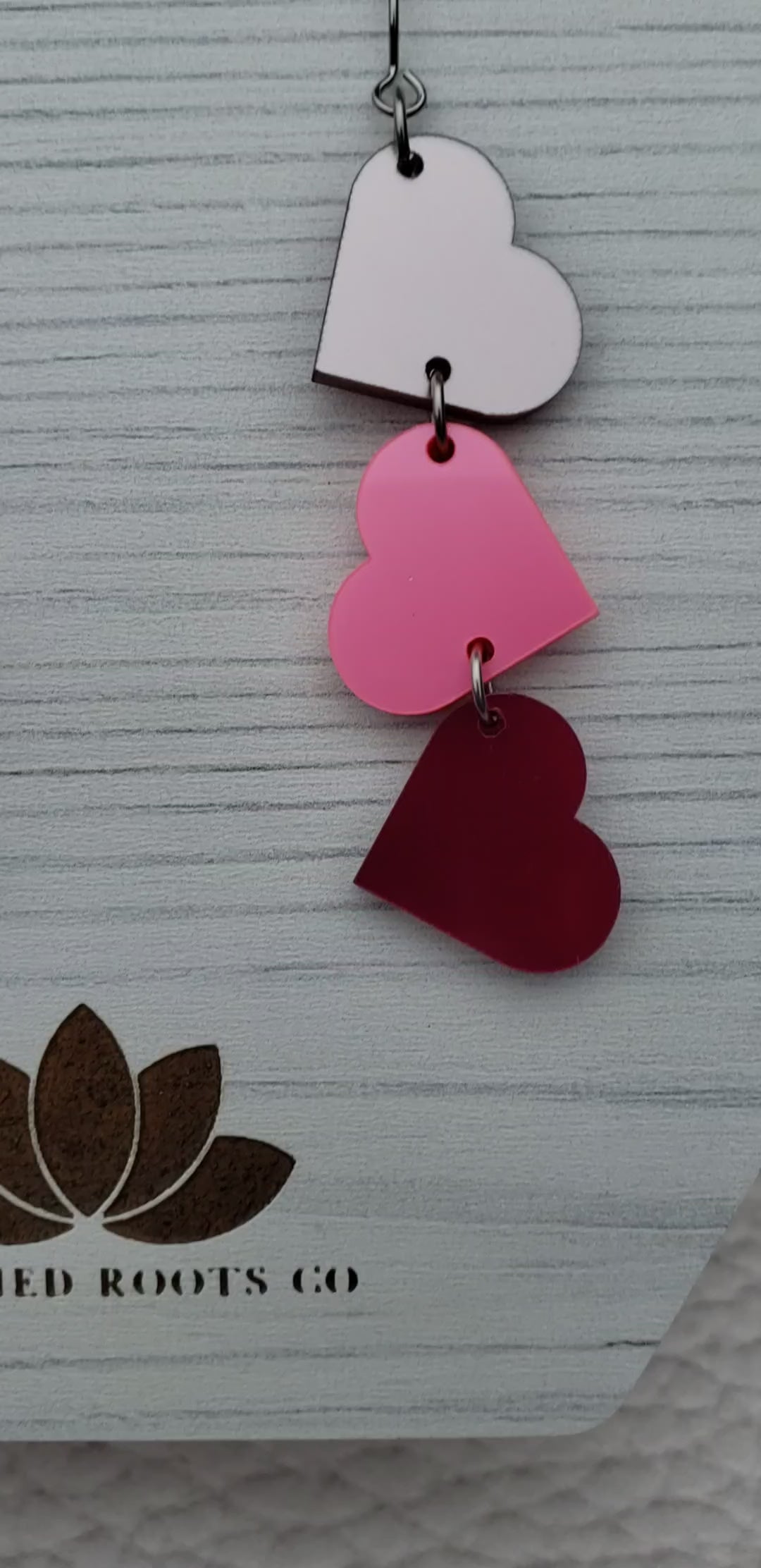 Pink Metallic Tumbling Heart Earrings on Stainless Steel